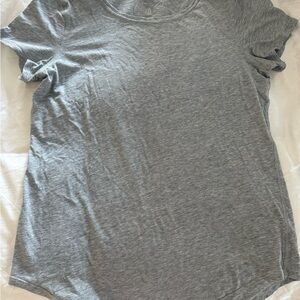 Gray short sleeved Lululemon t-shirt.
